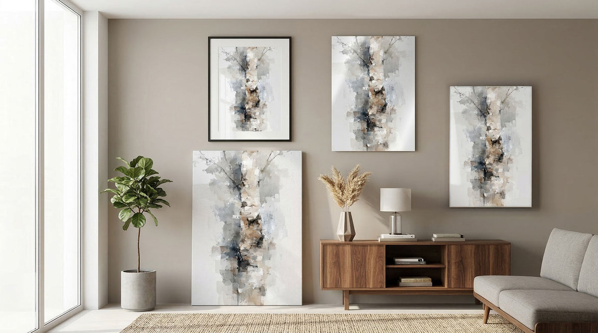 Multiple canvas and framed art prints displayed in a neutral modern living room