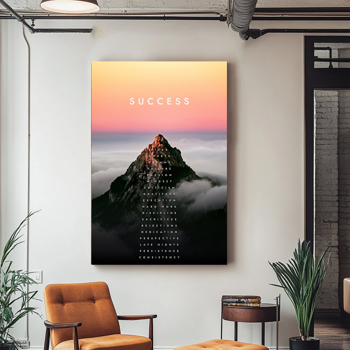 A motivational metal print of a glowing mountain peak at sunrise with the word "SUCCESS" and a vertical list of motivational attributes climbing the mountain.