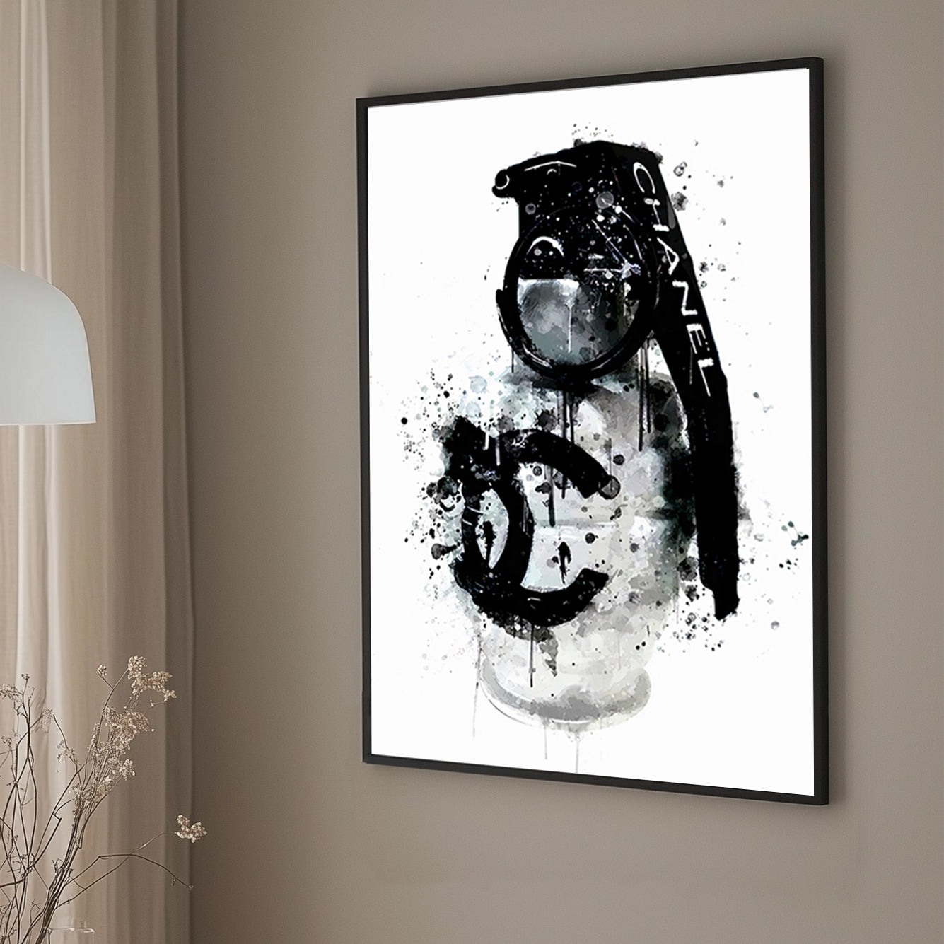 A wall art print of a Chanel branded grenade dripping with black ink splatters on a white background, combining luxury and chaos.