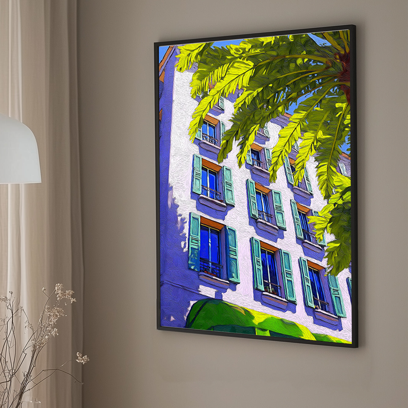 Brightly coloured wall art print of a Mediterranean-style building with green shutters and a palm tree, set against a vivid blue sky.