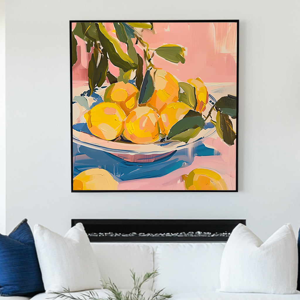 Vibrant still life wall art print of lemons on a blue and white plate, set against a pink background, ideal for adding a splash of freshness and color to home decor.