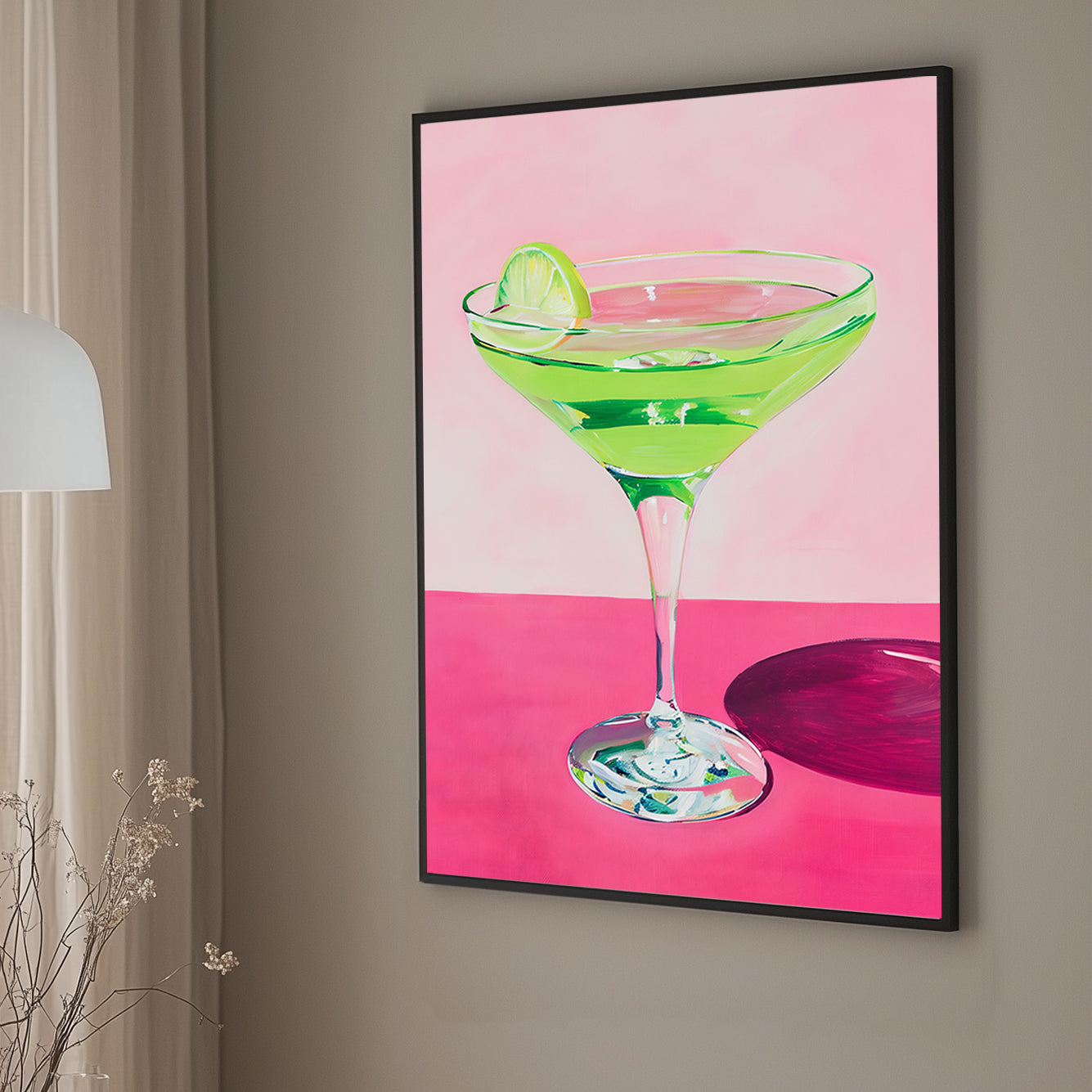 Vibrant wall art print of a green cocktail with a lime wedge in a martini glass, set against a pink background, perfect for adding a splash of color and zest to any space.
