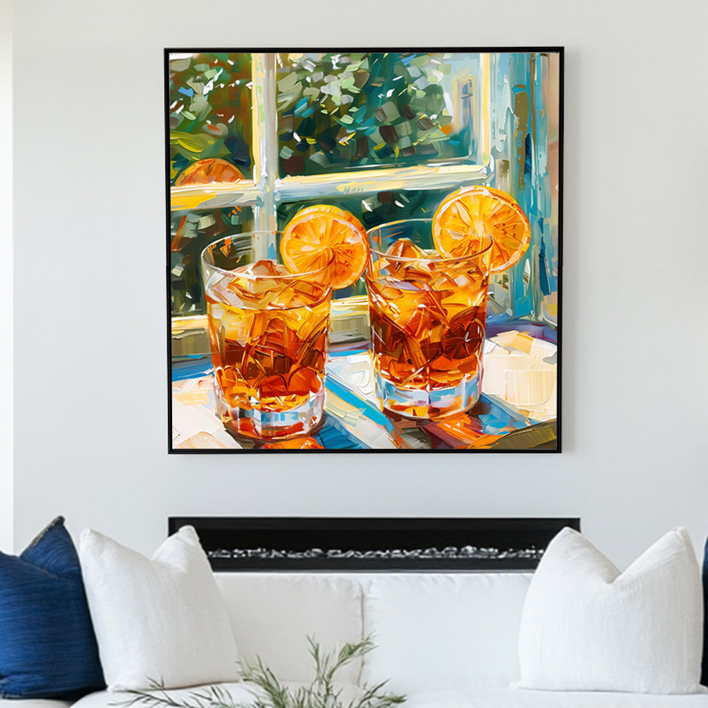 wall art print of two glasses of iced tea with orange slices, set against a garden view through a window, capturing the essence of summer refreshment and relaxation.