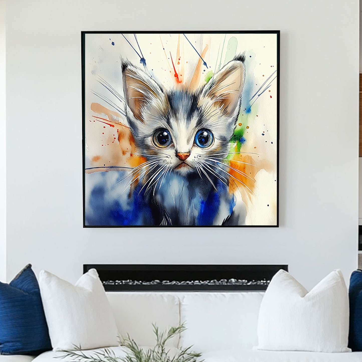 A whimsical watercolor-style wall art print of a kitten with one blue and one golden eye, surrounded by splashes of vibrant colours