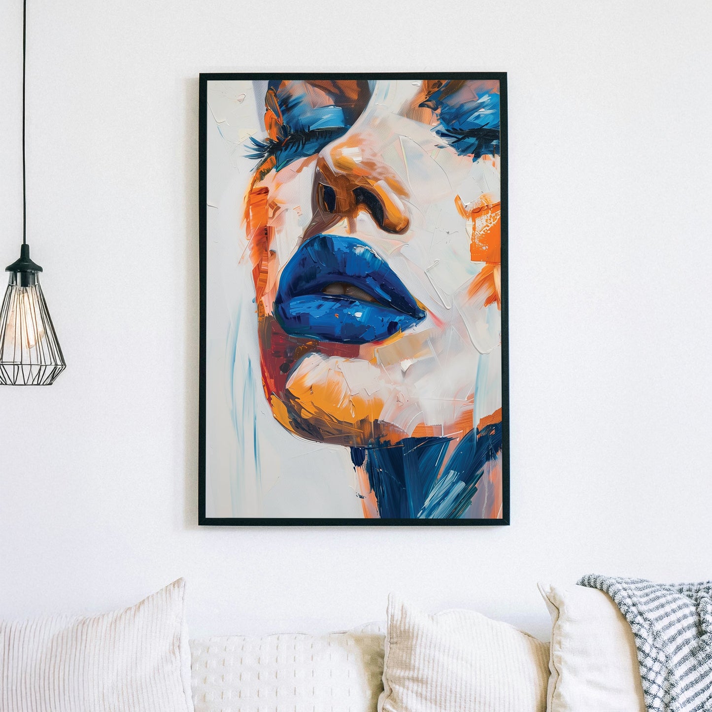 A bold abstract wall art print featuring blue lips with thick, textured paint in orange and peach tones, creating a striking contrast