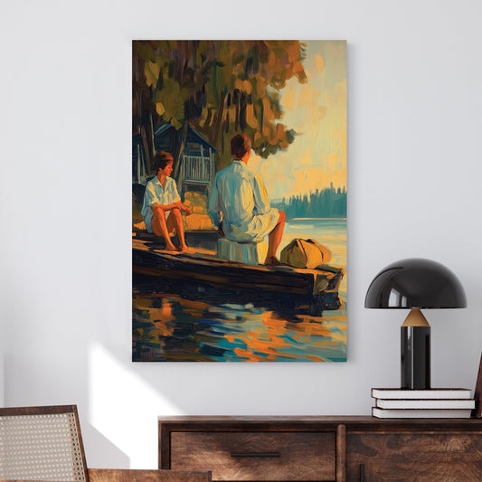 Oil-style wall art of a couple sitting on a wooden dock at sunset, with reflections on the water and a rustic cabin in the background.