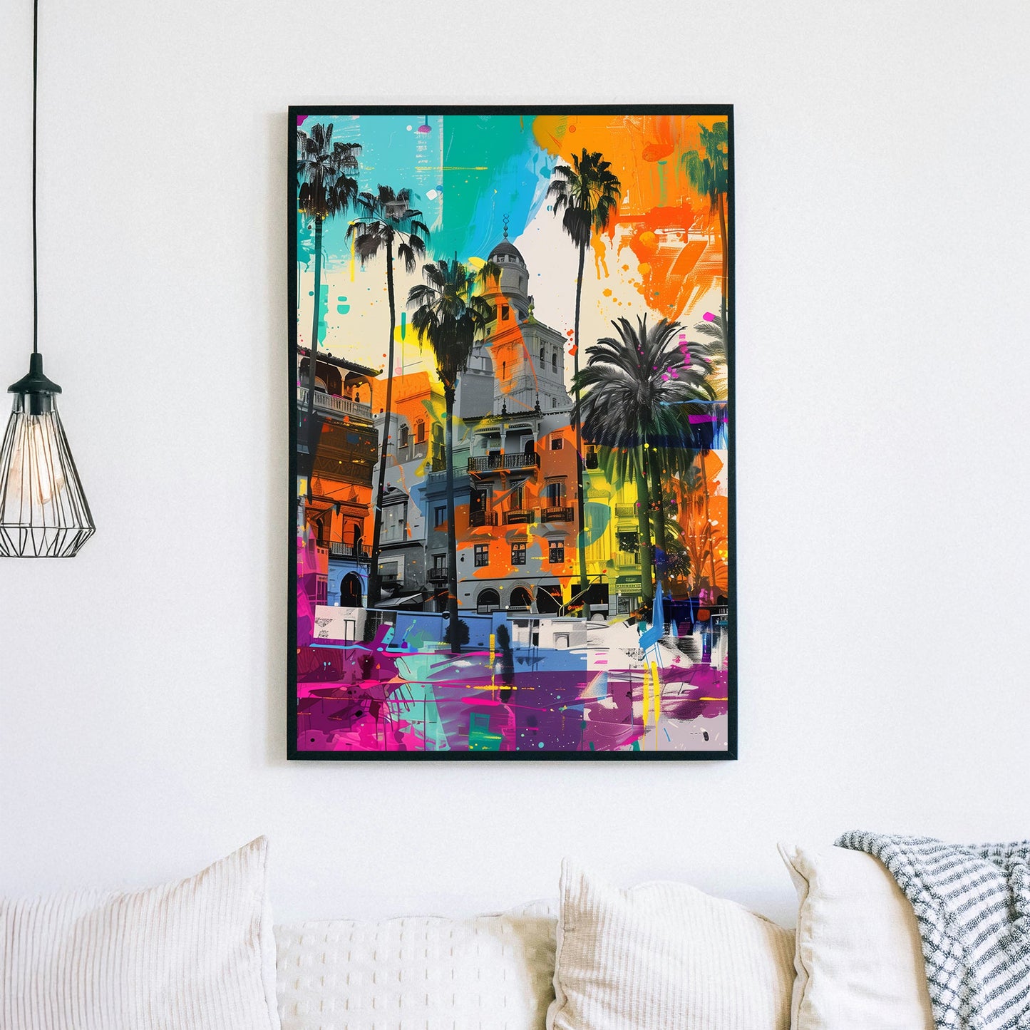 Graffiti-style artwork of Mediterranean buildings with bold neon splashes, towering palm trees, and a sunset-inspired colour palette.
