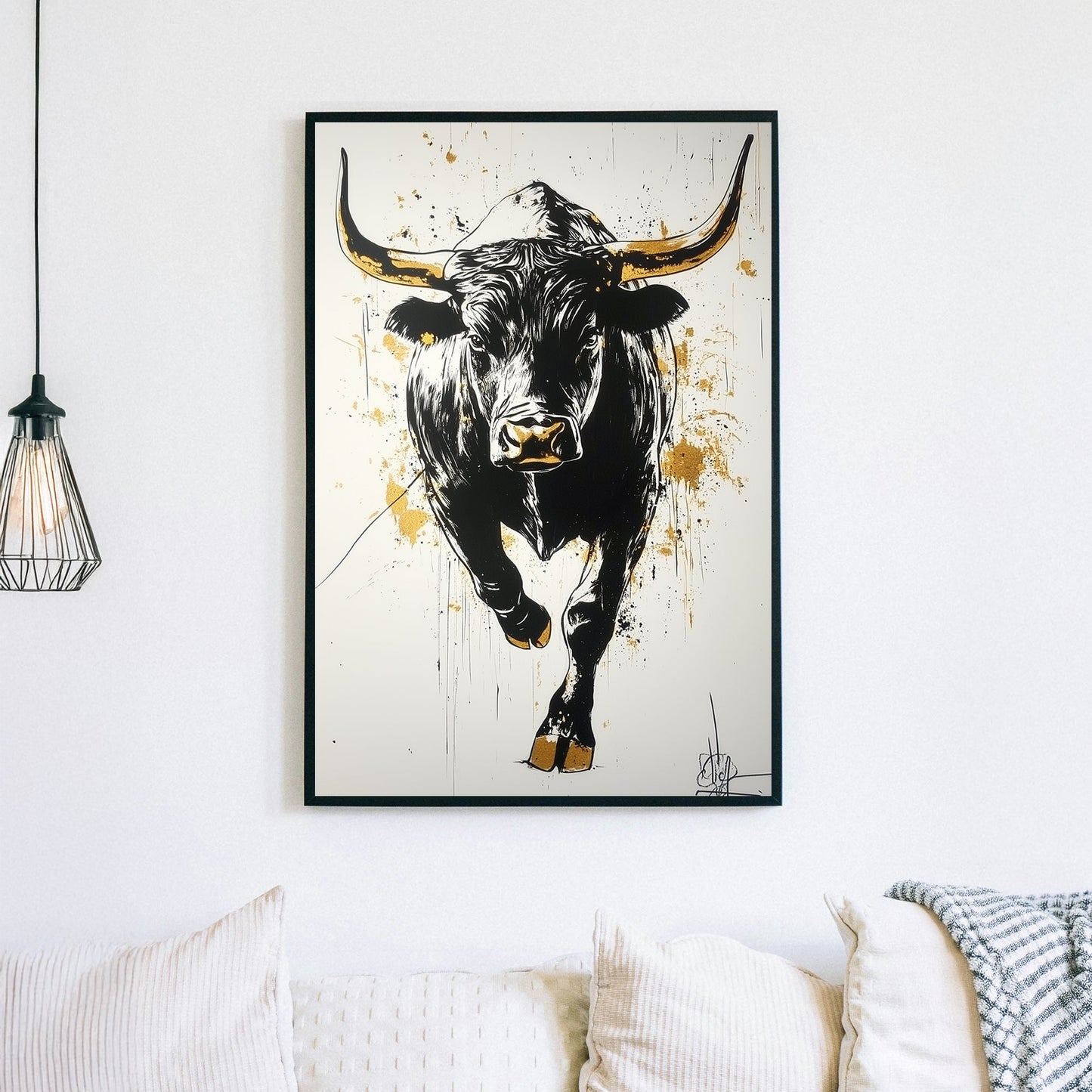 Black and gold charging bull wall art with urban splatter effect.