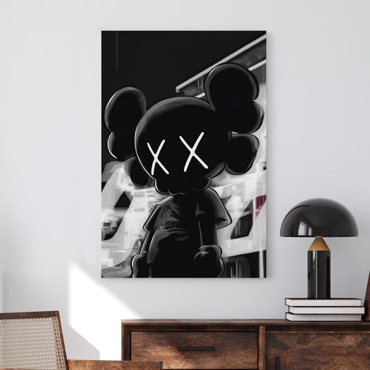 Black and white street-style wall art featuring an KAWS character with X eyes.