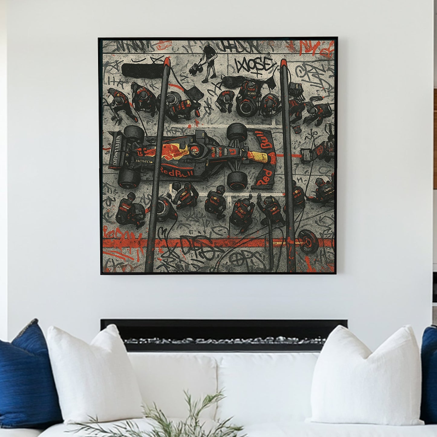 Overhead view of Red Bull F1 pit stop surrounded by graffiti wall art