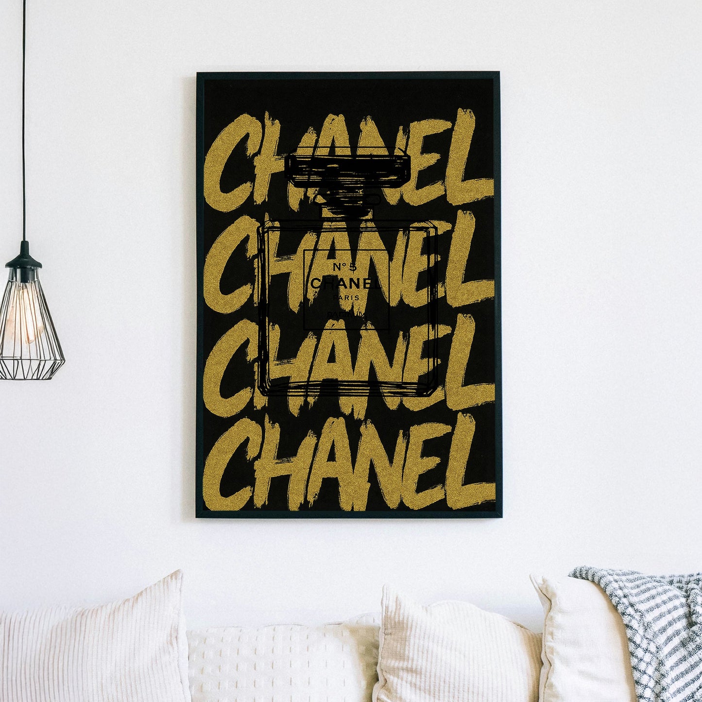 Chanel No. 5 perfume bottle sketch over bold gold Chanel lettering wall art