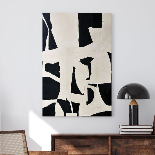 Abstract black and white wall art with geometric shapes and modern design
