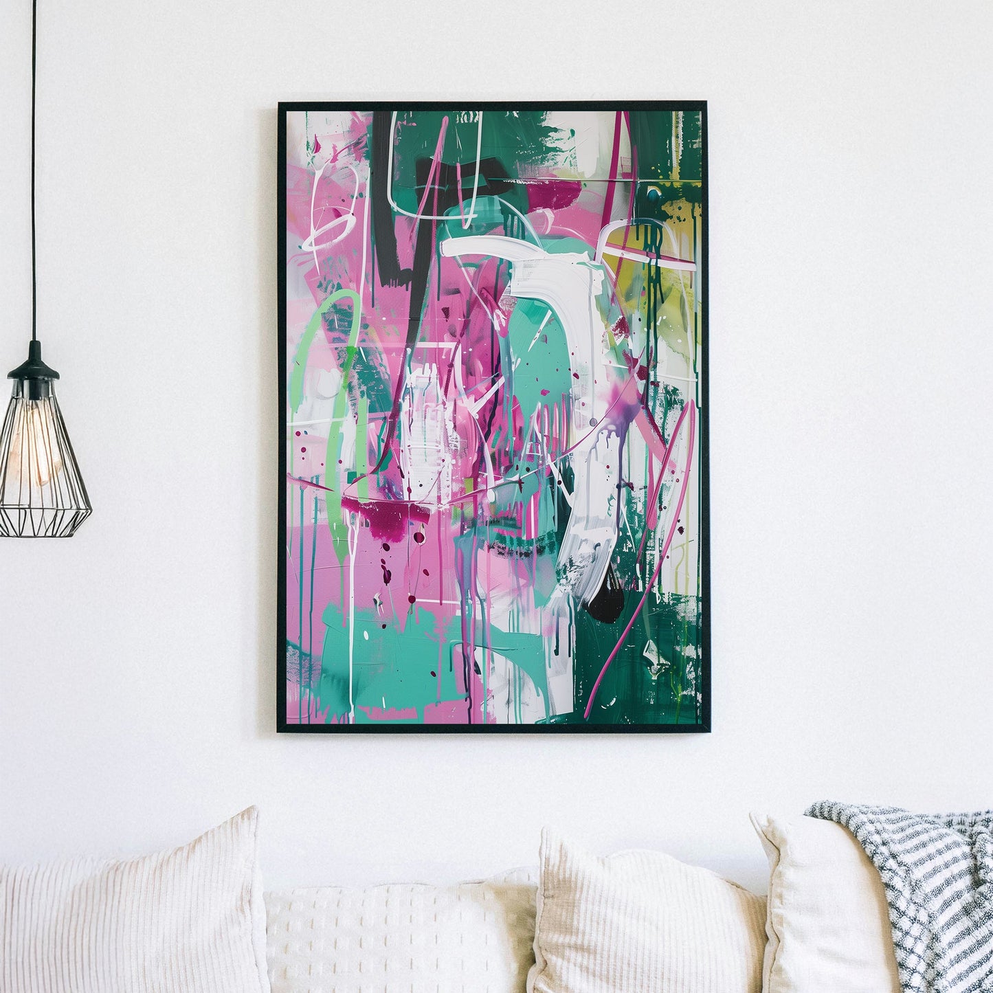 Wall art with abstract graffiti-style brushstrokes in pink, green, and white