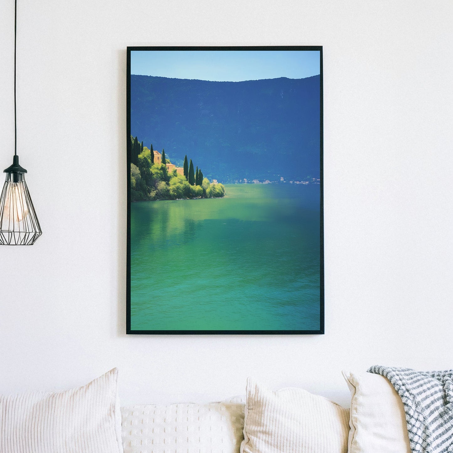 Wall art of a tranquil lakeside village surrounded by hills and still water