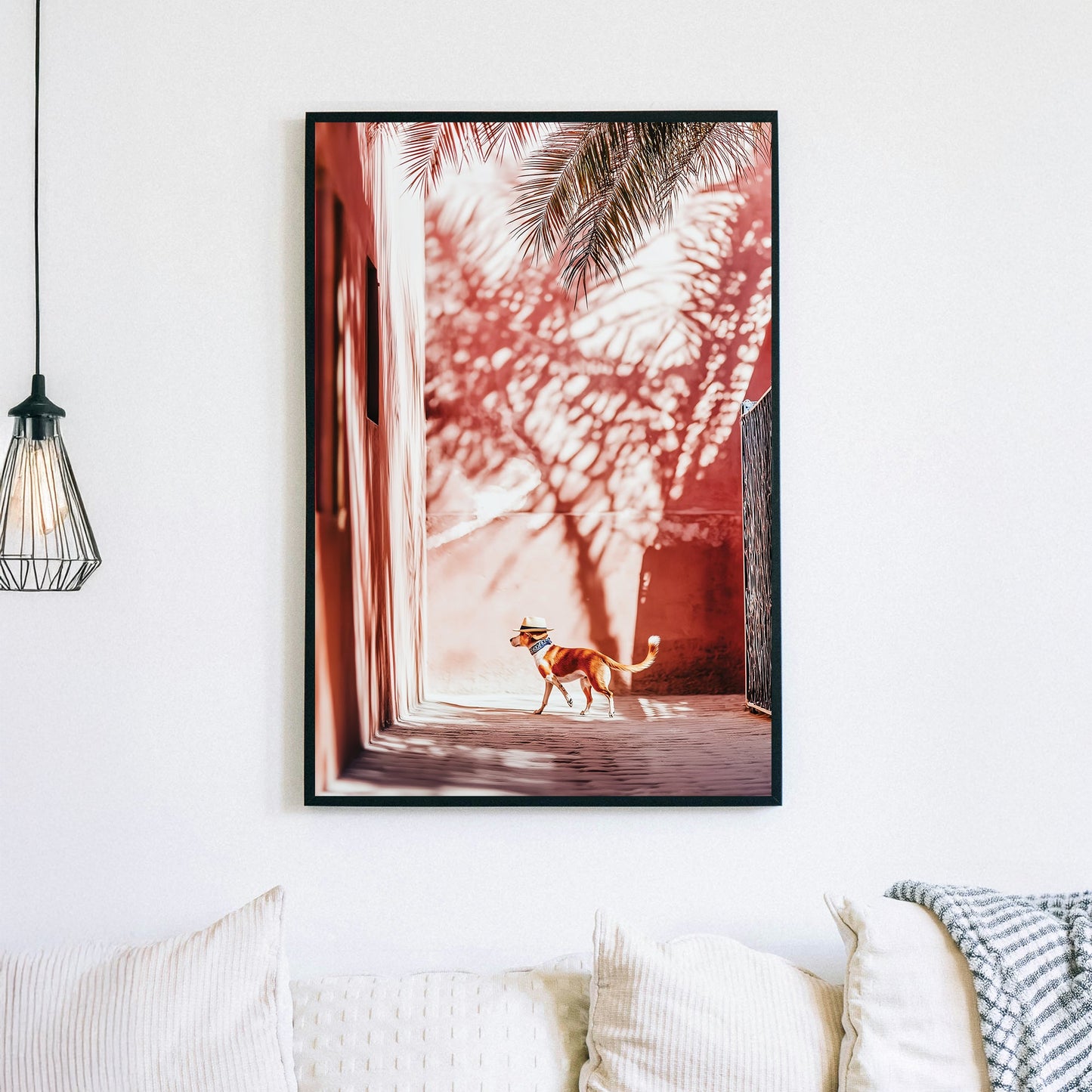 Stylish dog wearing a hat walking through a sunlit alley with palm shadows on pink walls