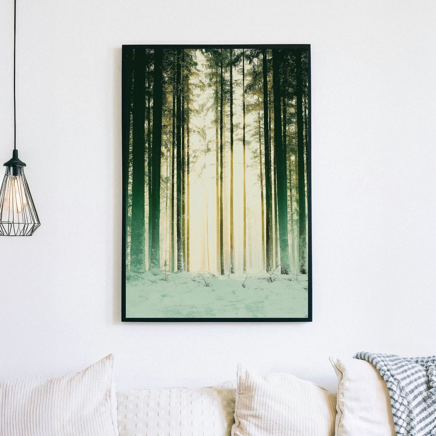 snowy forest with sunlight through pine trees wall art