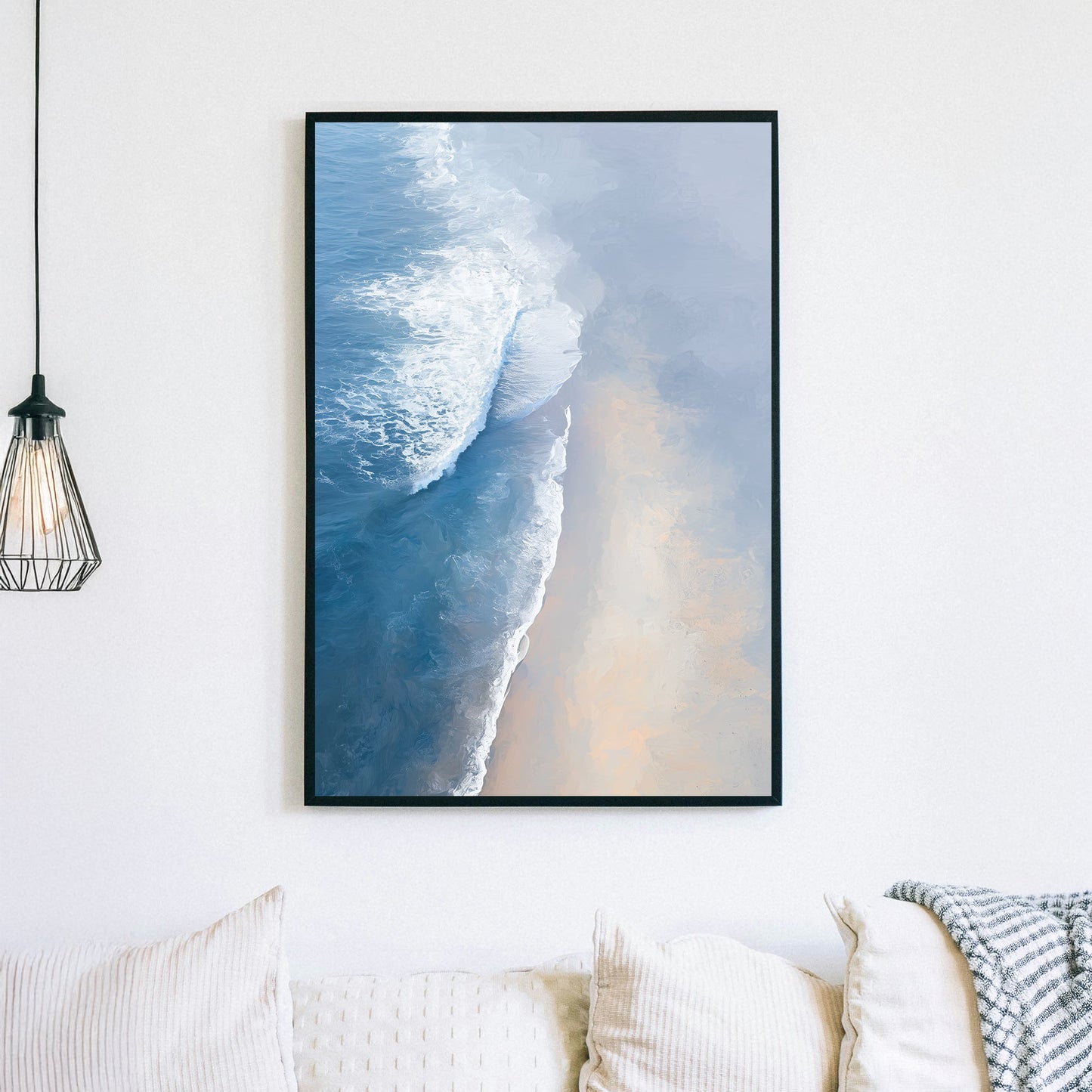 aerial painting of soft ocean waves meeting a sandy beach