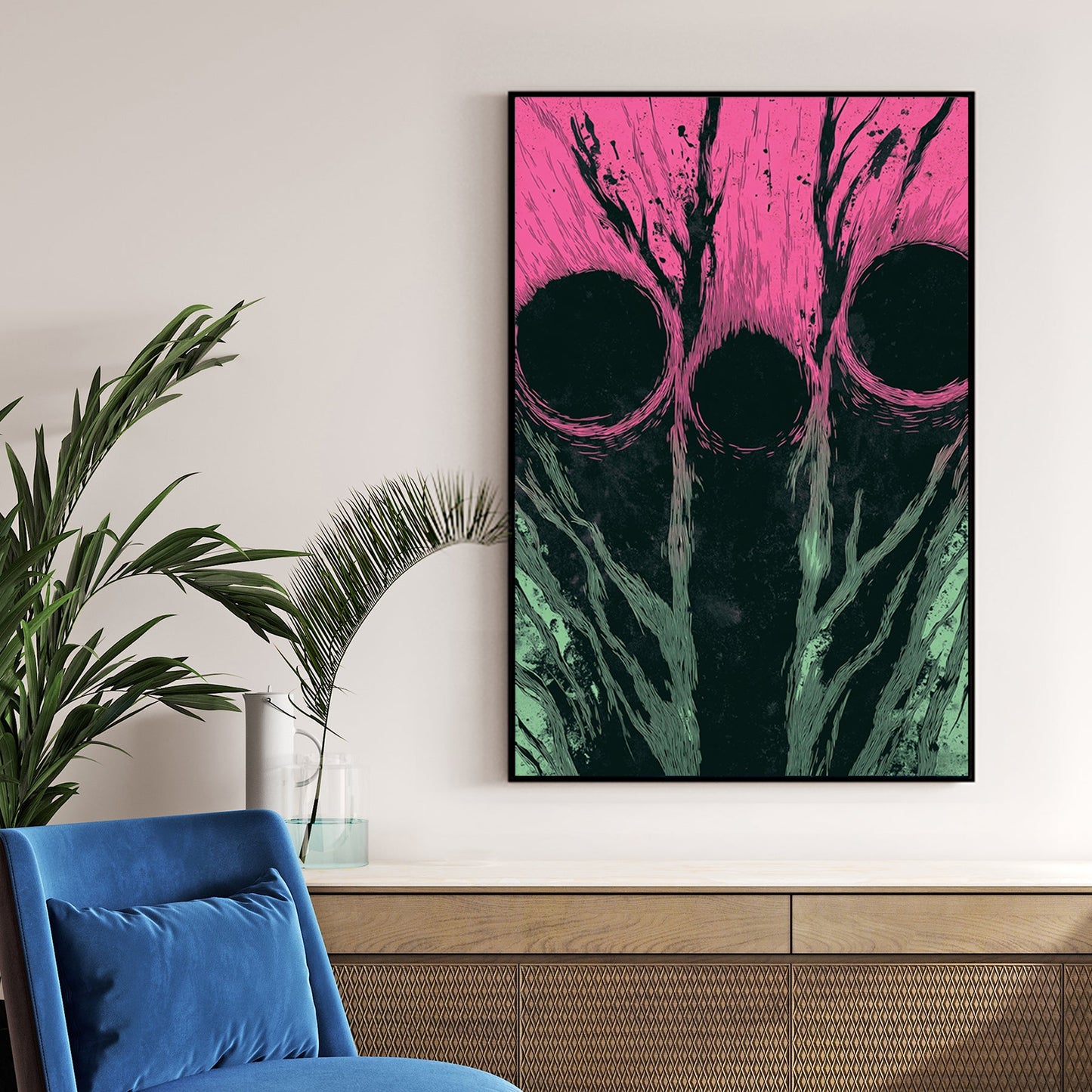 Abstract wall art with three dark circles over pink and green textured background