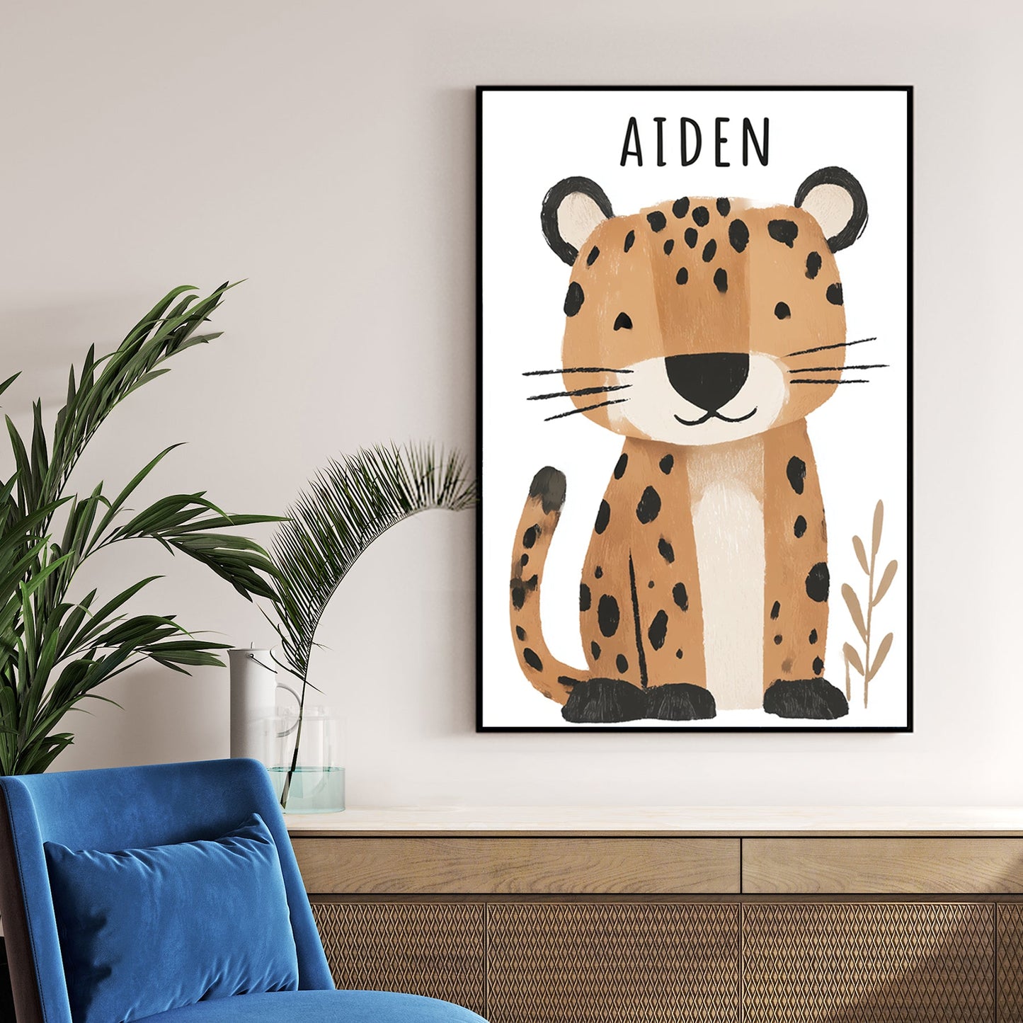 Cute leopard nursery wall art with the name Aiden in soft cartoon style