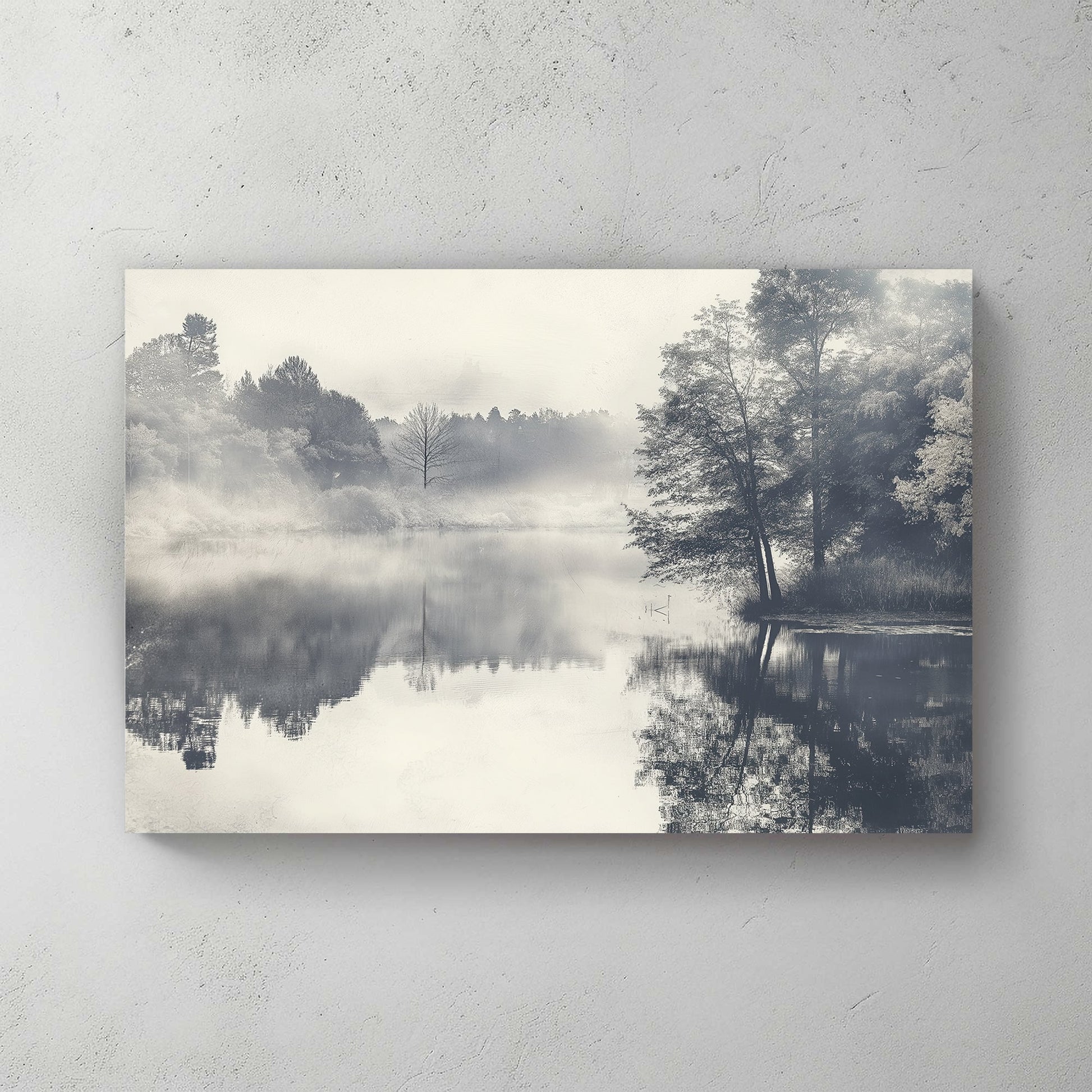 black and white landscape of foggy lake with trees reflected in still water