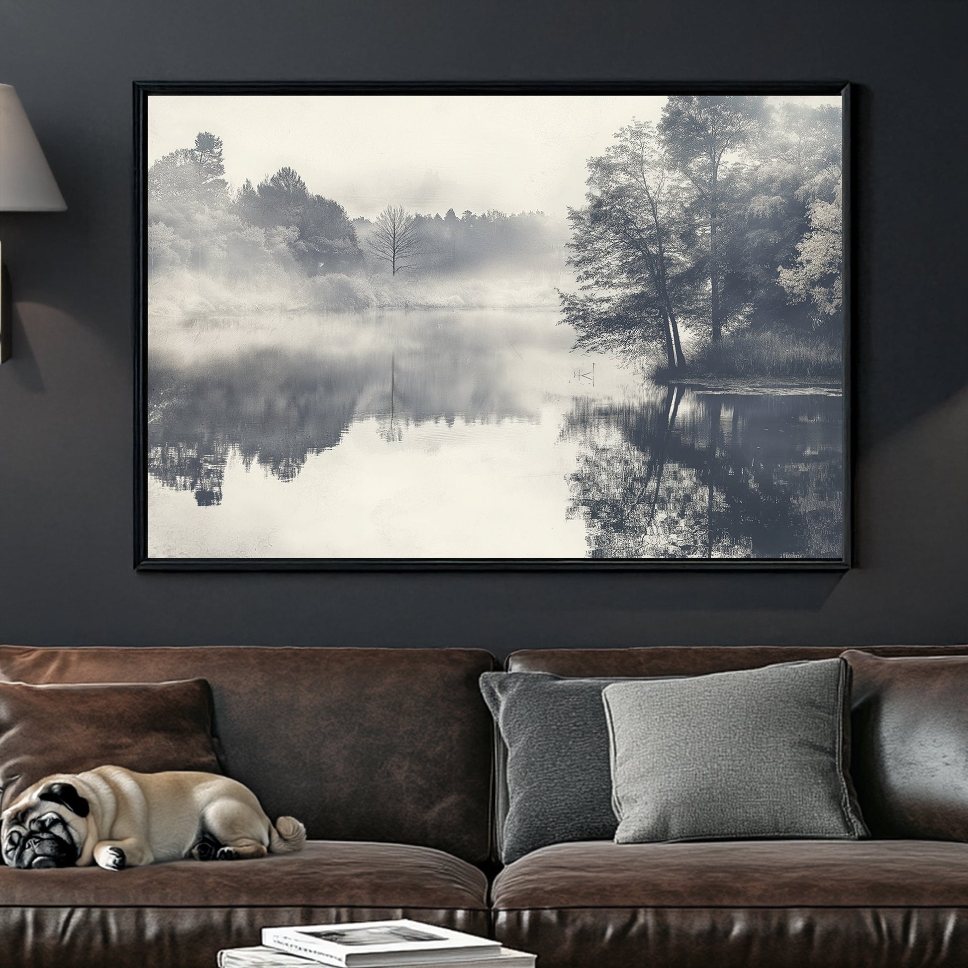 black and white landscape of foggy lake with trees reflected in still water