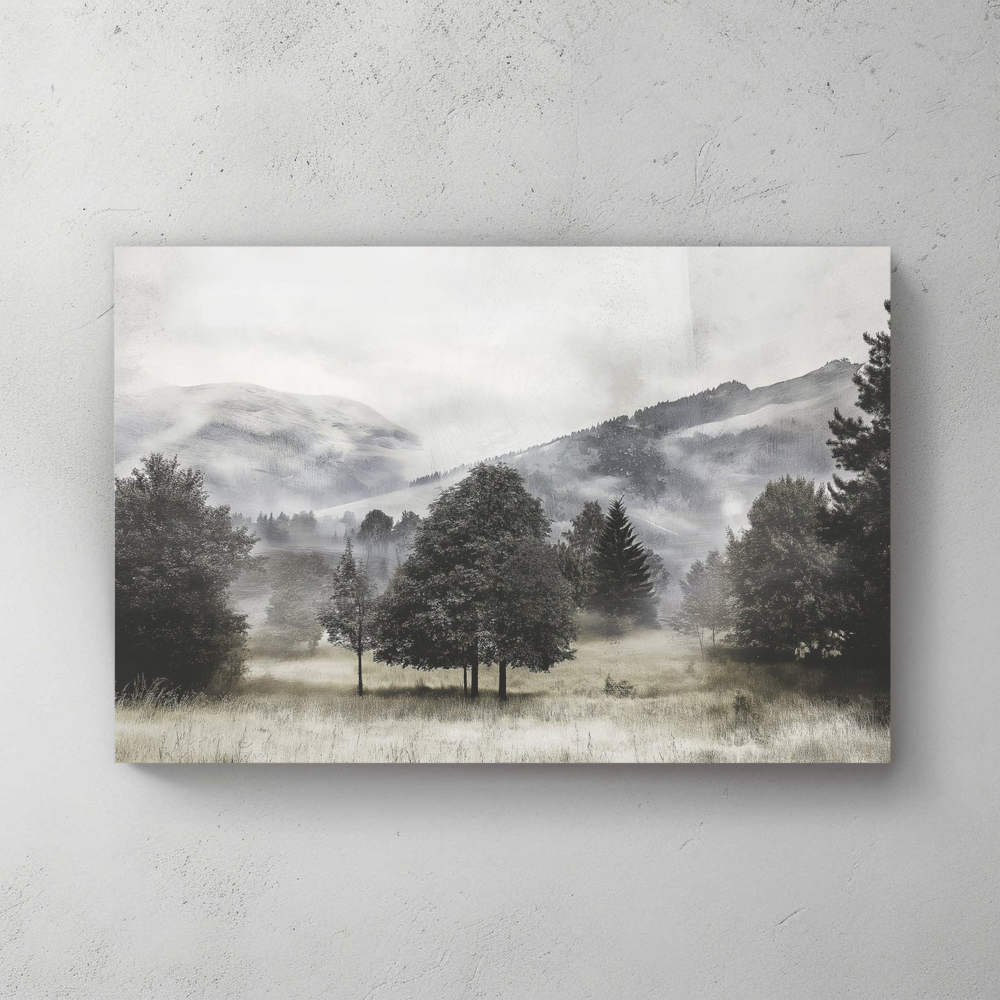 black and white landscape of foggy trees and distant hills in open meadow