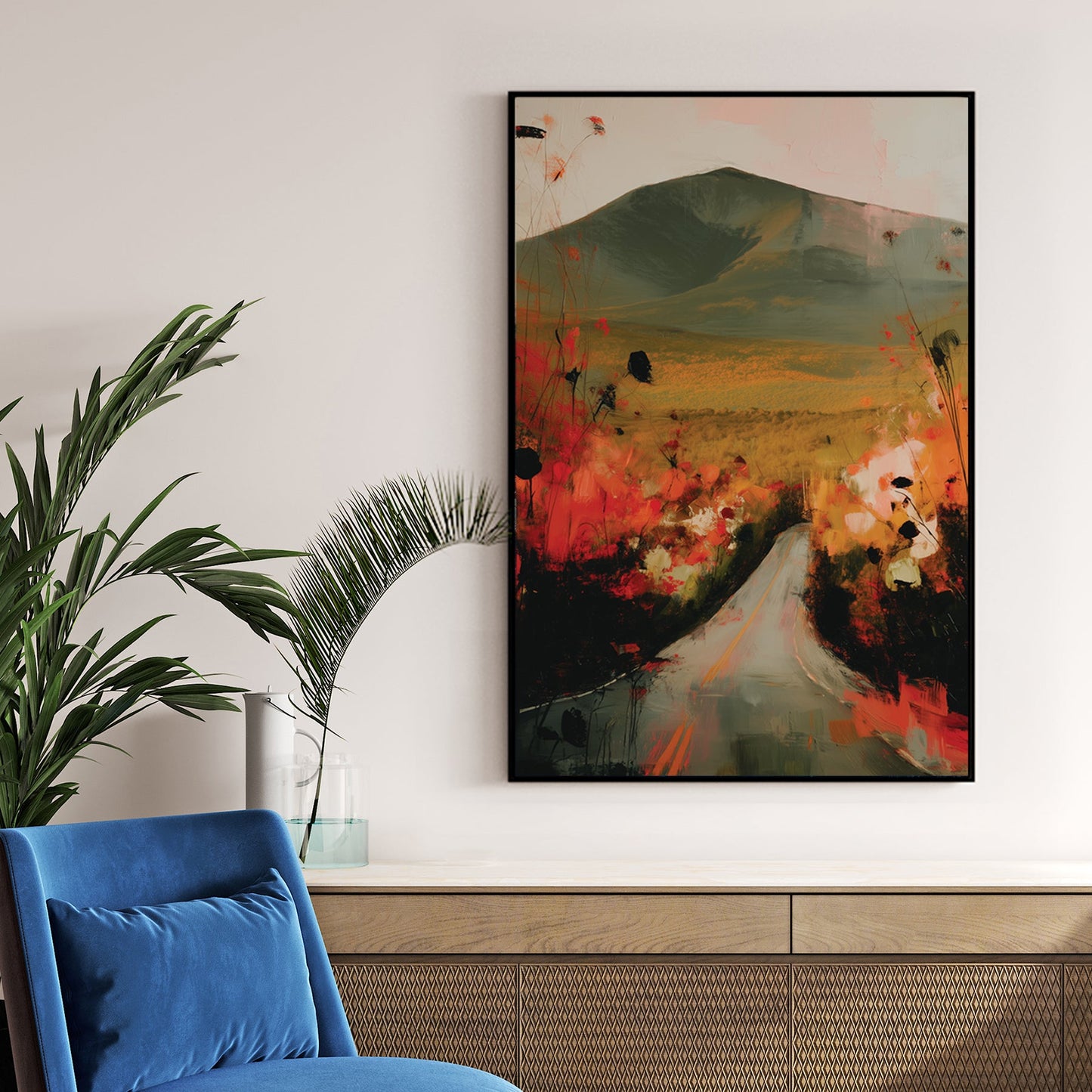 autumn landscape wall art with road, mountain and wildflowers in red and gold tones