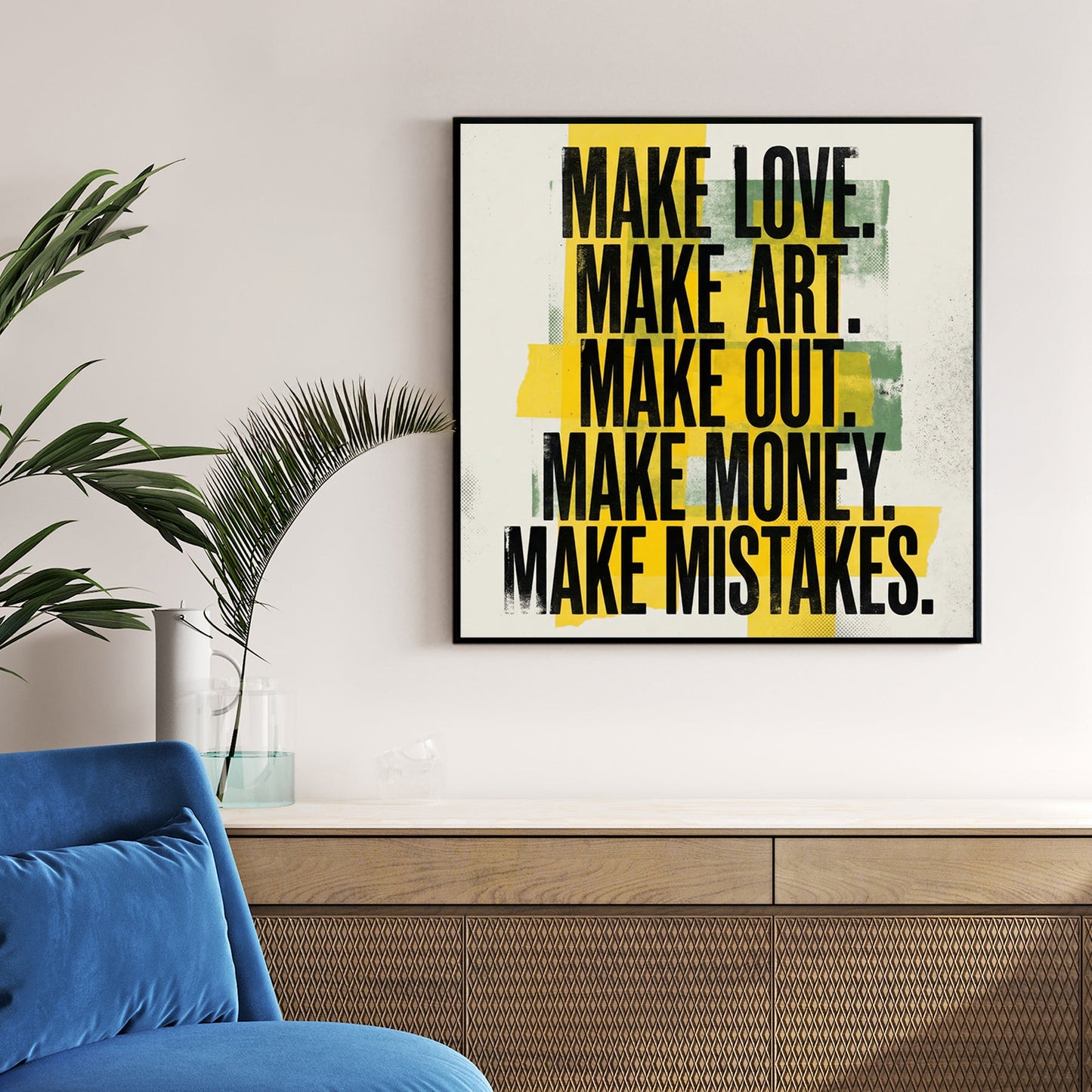 Typography wall art featuring 'Make Love Make Art' text and yellow abstract blocks.