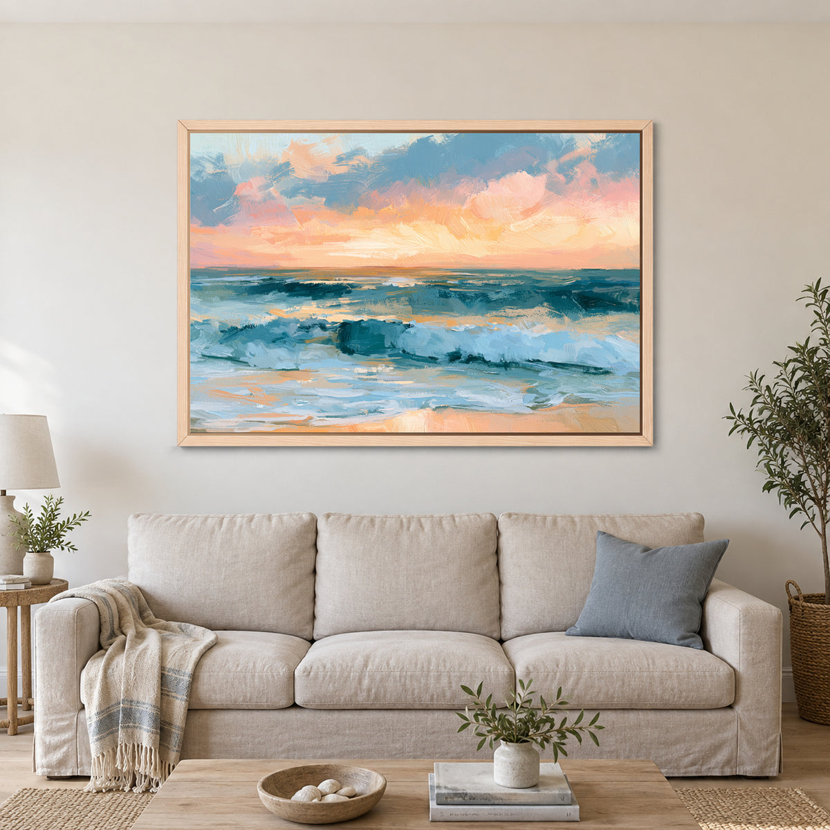 Sunset Surf Cloud Bank framed canvas in a natural wood floating frame above a linen sofa with a blue cushion