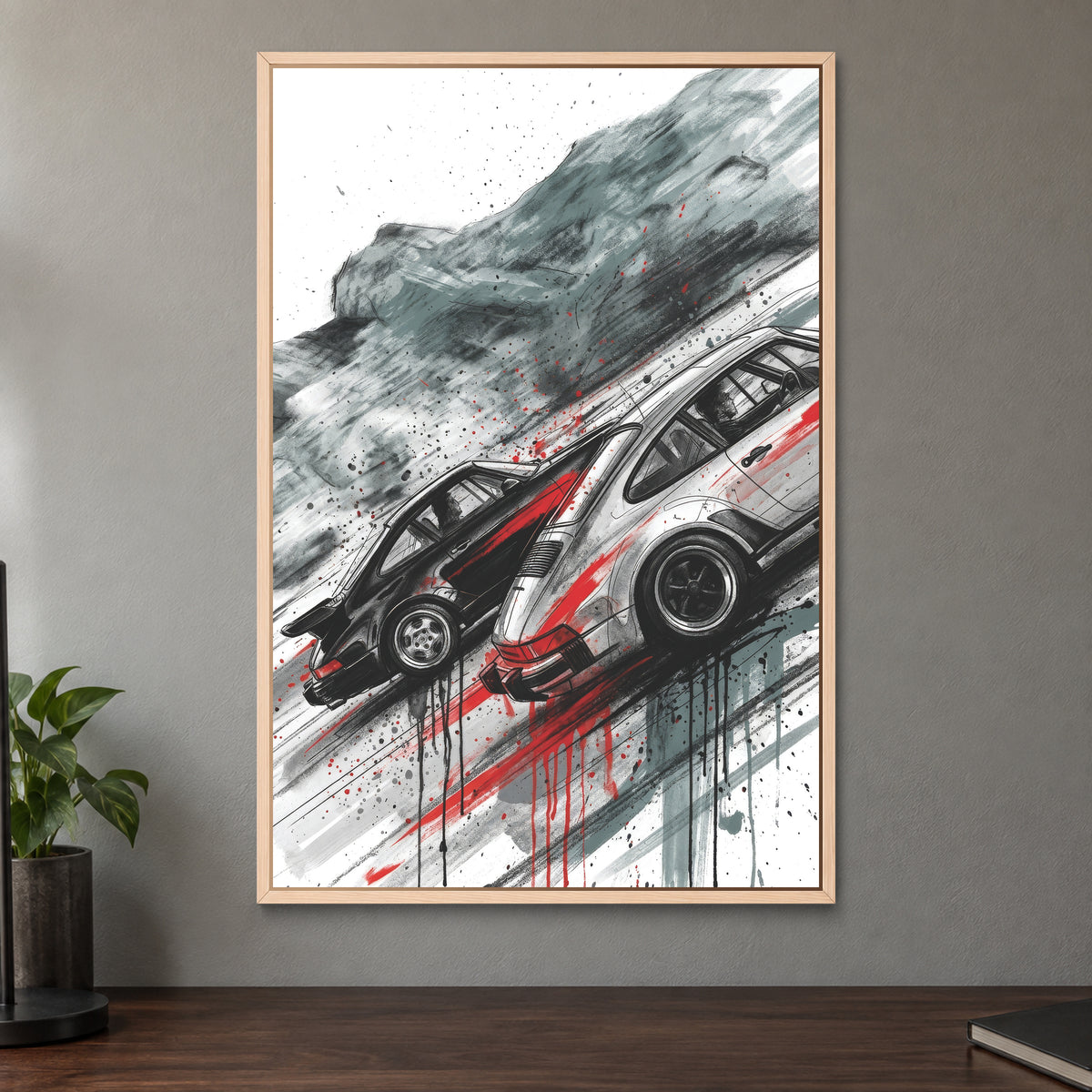 Porsche 911 Turbo Chase framed canvas in a natural wood floating frame on a taupe wall above a dark walnut sideboard with a potted plant