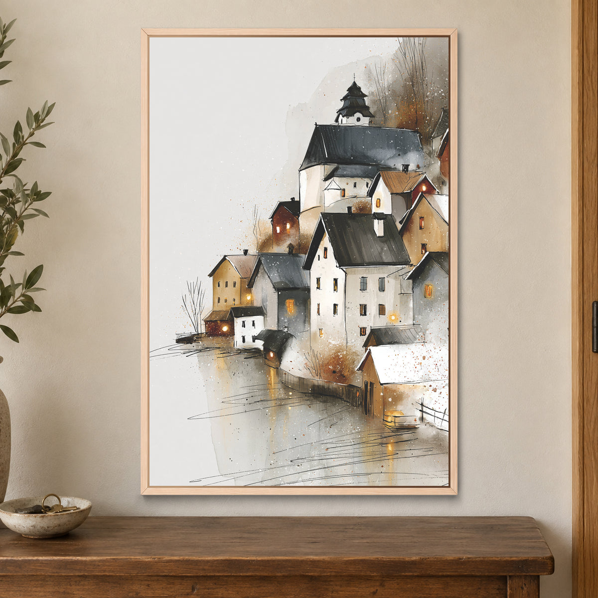 Hallstatt Austria Lakeside Tower framed canvas in a natural wood floating frame on a cream wall above a wooden sideboard beside a door frame