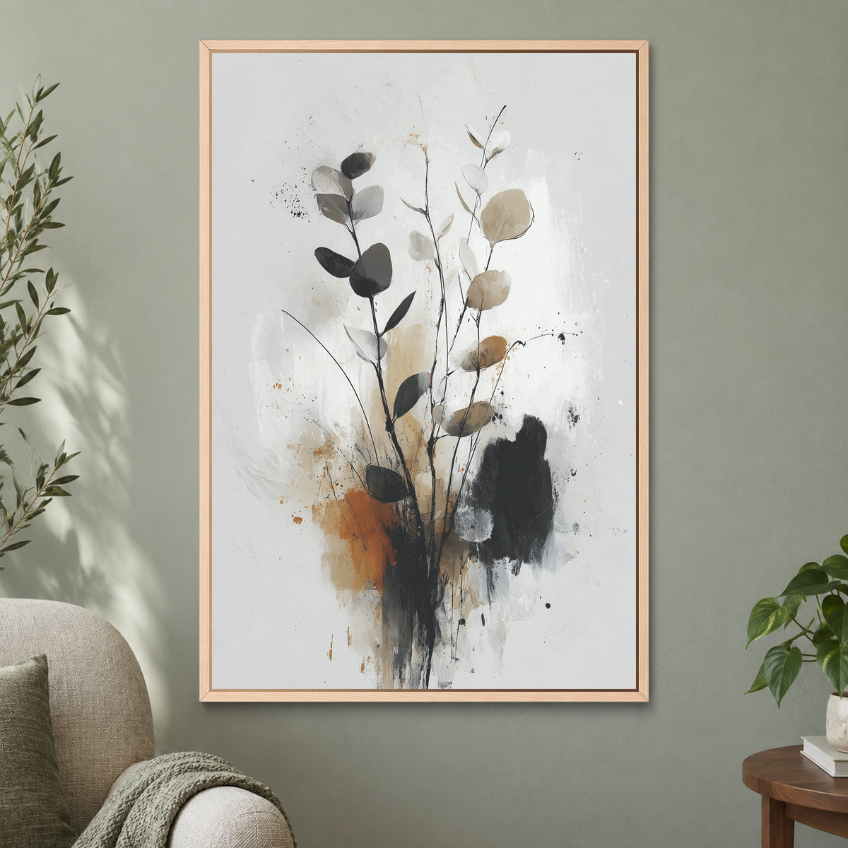 Eucalyptus Stems Minimalist framed canvas in a natural wood floating frame on a sage green wall beside a cream armchair