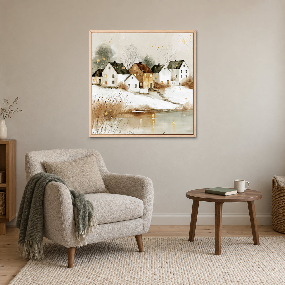 Farmhouse Row Above the Pond framed canvas in a natural wood floating frame above a cream armchair and round wooden side table