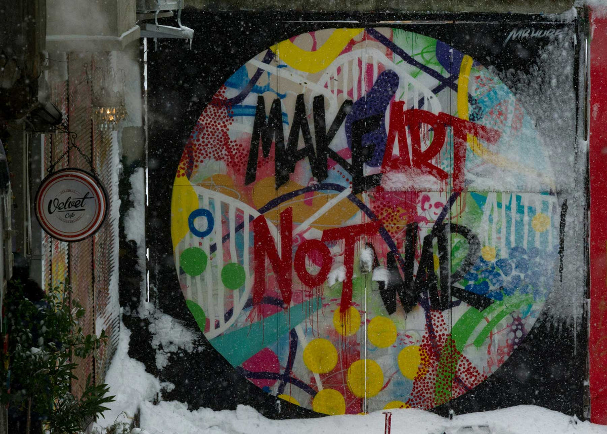 basquiat make art not war street artist