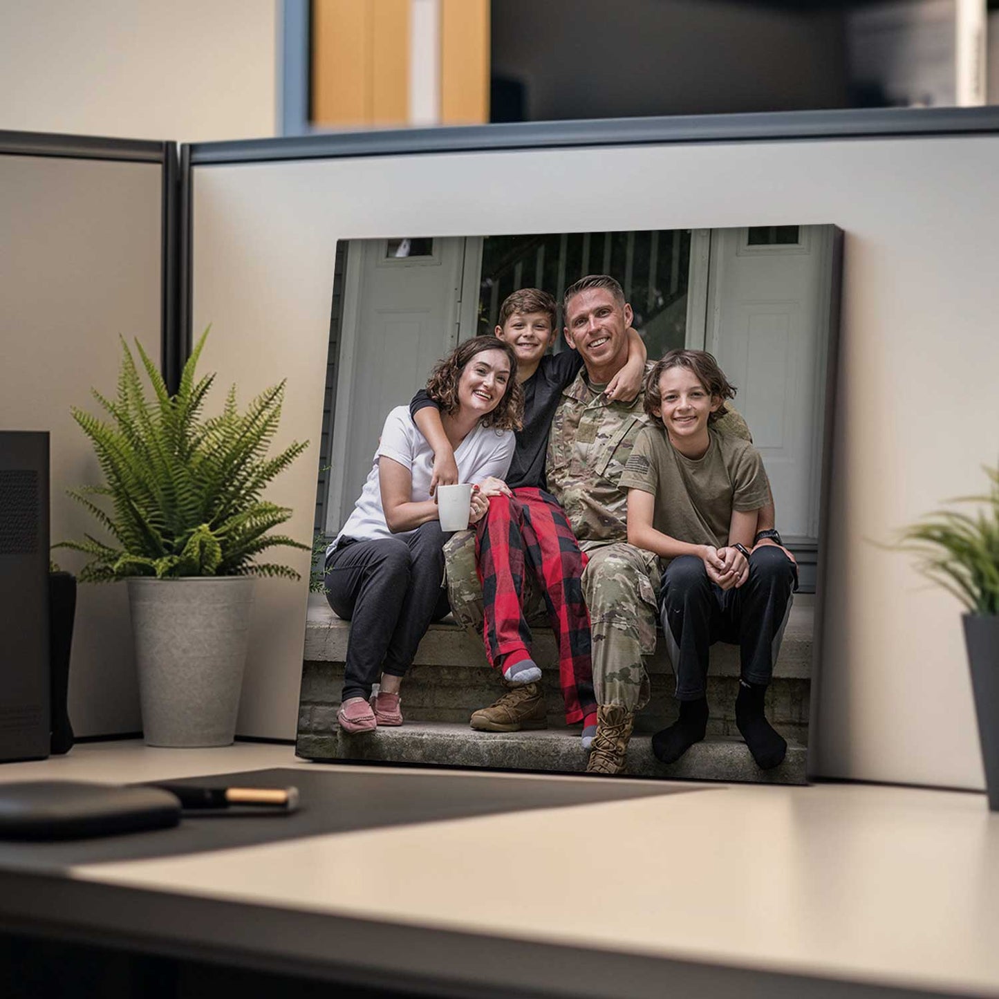 Custom canvas print of a family on an office desk