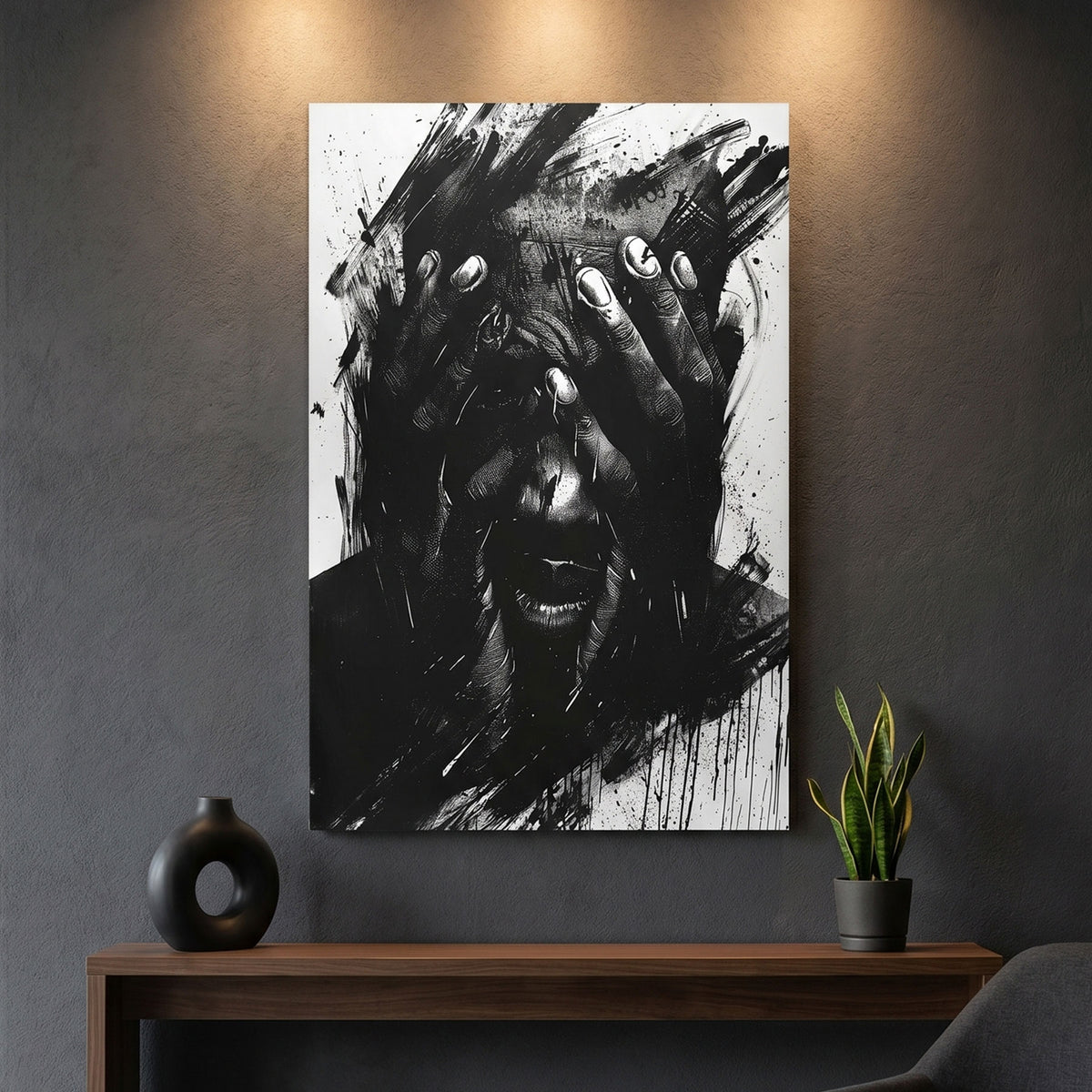 Abstract black and white canvas print on a wall above a wooden console table with decorative items.