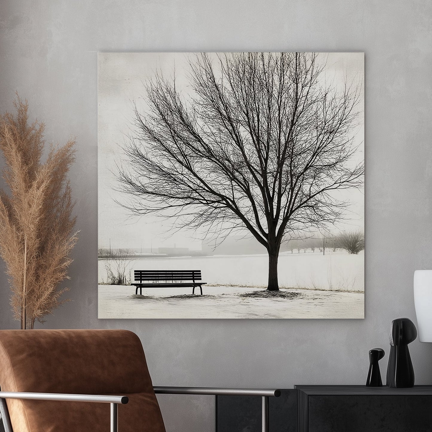 Lone tree with a bench in a snowy landscape, minimalist winter artwork.