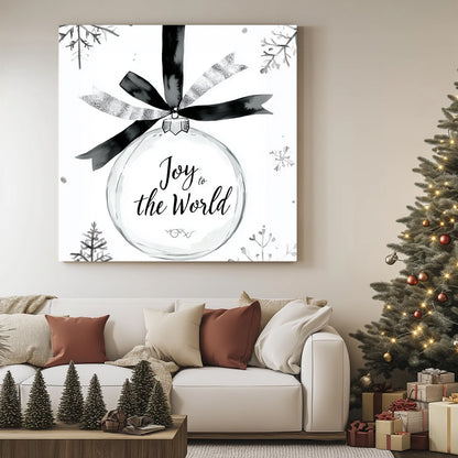 Black-and-white illustration of a holiday ornament with the phrase “Joy to the World” and surrounding snowflakes.