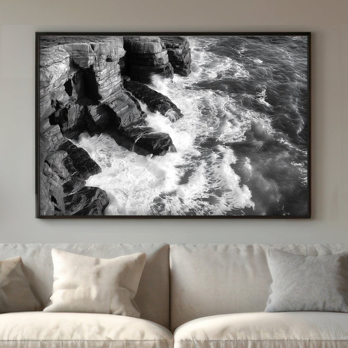 A black-and-white portrayal of rugged cliffs against the relentless ocean waves. Perfect for modern decor. canvas wall art abstract portrait landscape