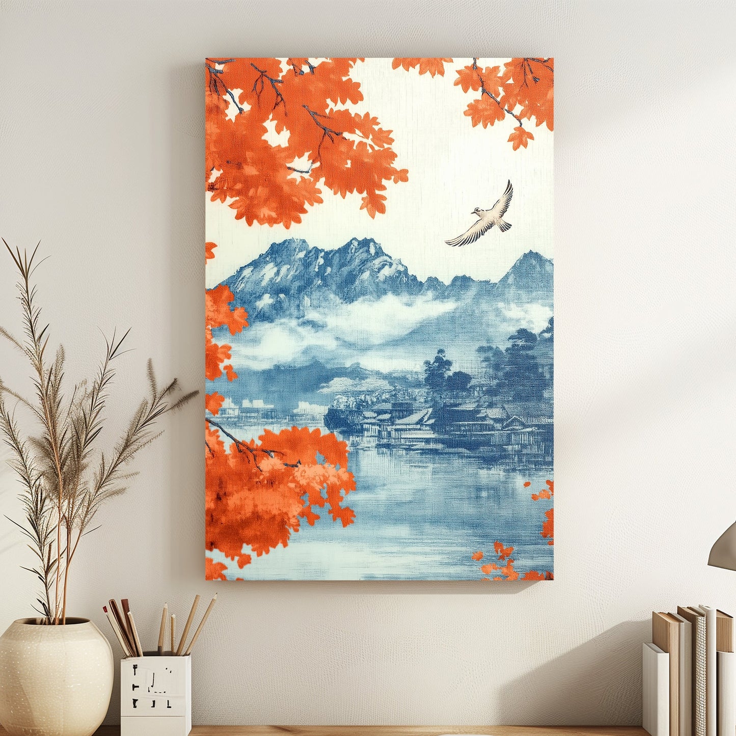 A serene mountain landscape framed by vibrant autumn leaves and a lone bird soaring over still water. Perfect for modern decor. canvas wall art abstract portrait