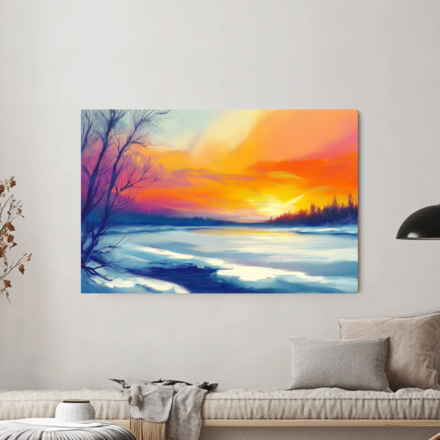 Vibrant winter sunset with orange and purple hues reflecting on a frozen lake surrounded by bare trees and distant evergreens.