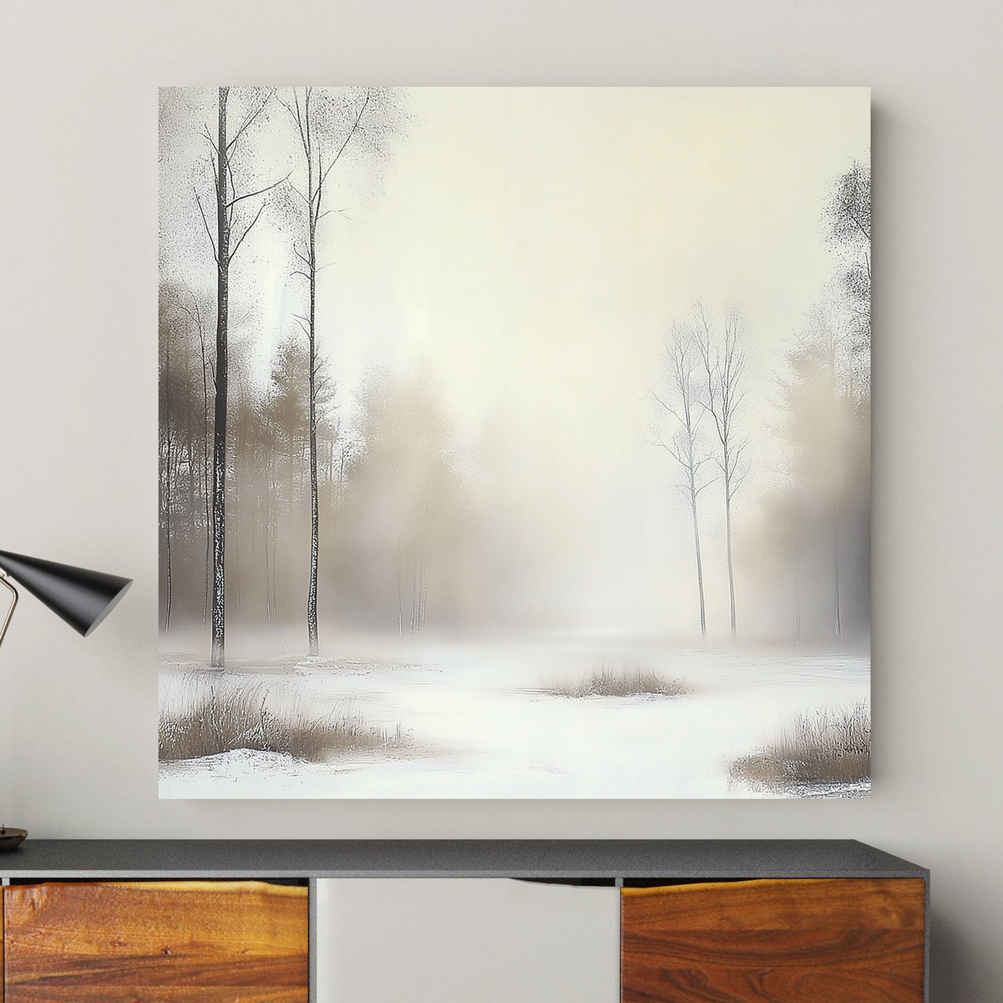 Winter landscape with tall, slender trees and a misty, frosted woodland backdrop.