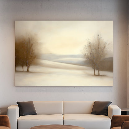 Serene snowy landscape with soft beige tones and bare trees under a pale winter sky.