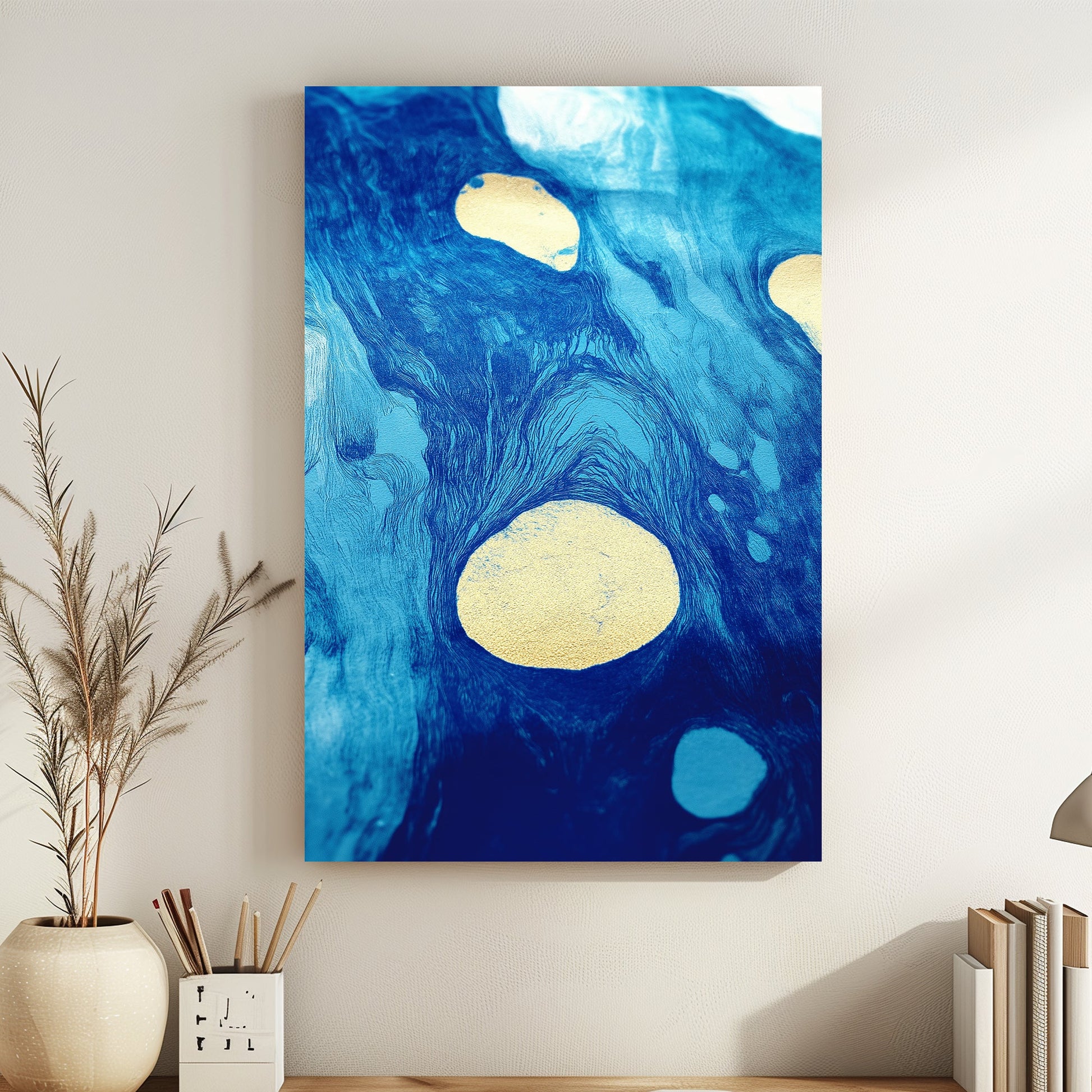 Abstract artwork featuring swirling blue tones with gold accents, resembling flowing water and celestial patterns.