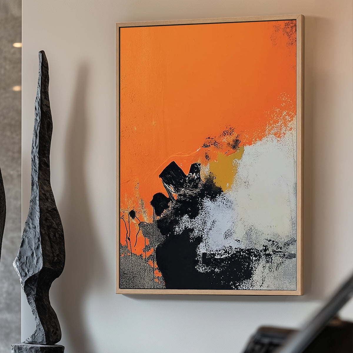 Abstract art featuring vivid orange tones with black and white textured contrasts in an expressionist style.