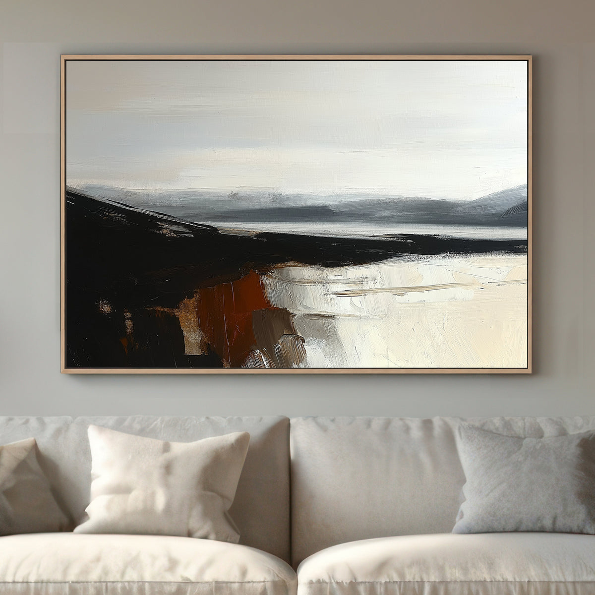 Minimalist landscape with black cliffs, grey mountains, and cream reflections on calm water.