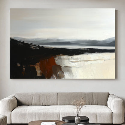 Minimalist landscape with black cliffs, grey mountains, and cream reflections on calm water.