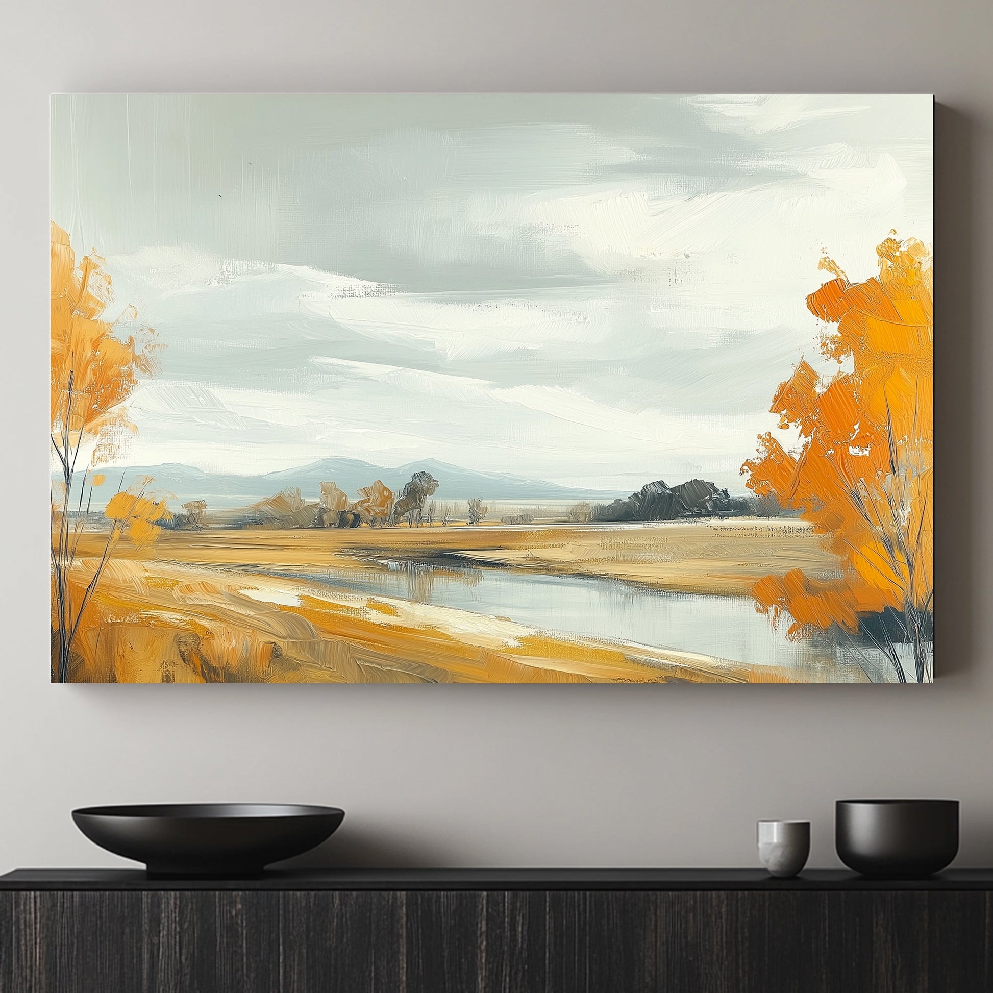 Autumn landscape with golden trees, a calm stream, and an overcast sky.