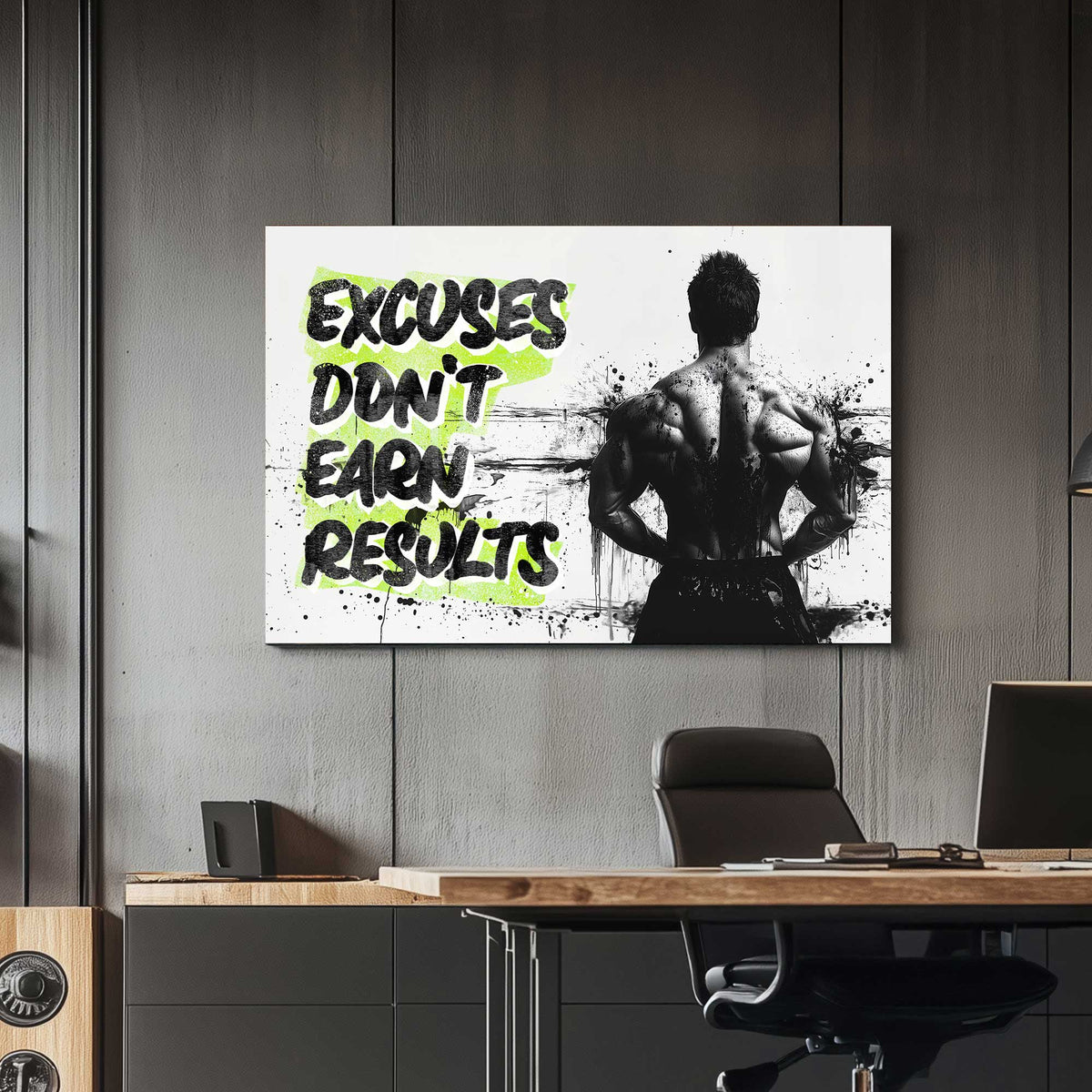 A black-and-white wall art print of a bodybuilder’s back with bold text reading "Excuses Don’t Earn Results," surrounded by ink splatter for a dramatic effect.
