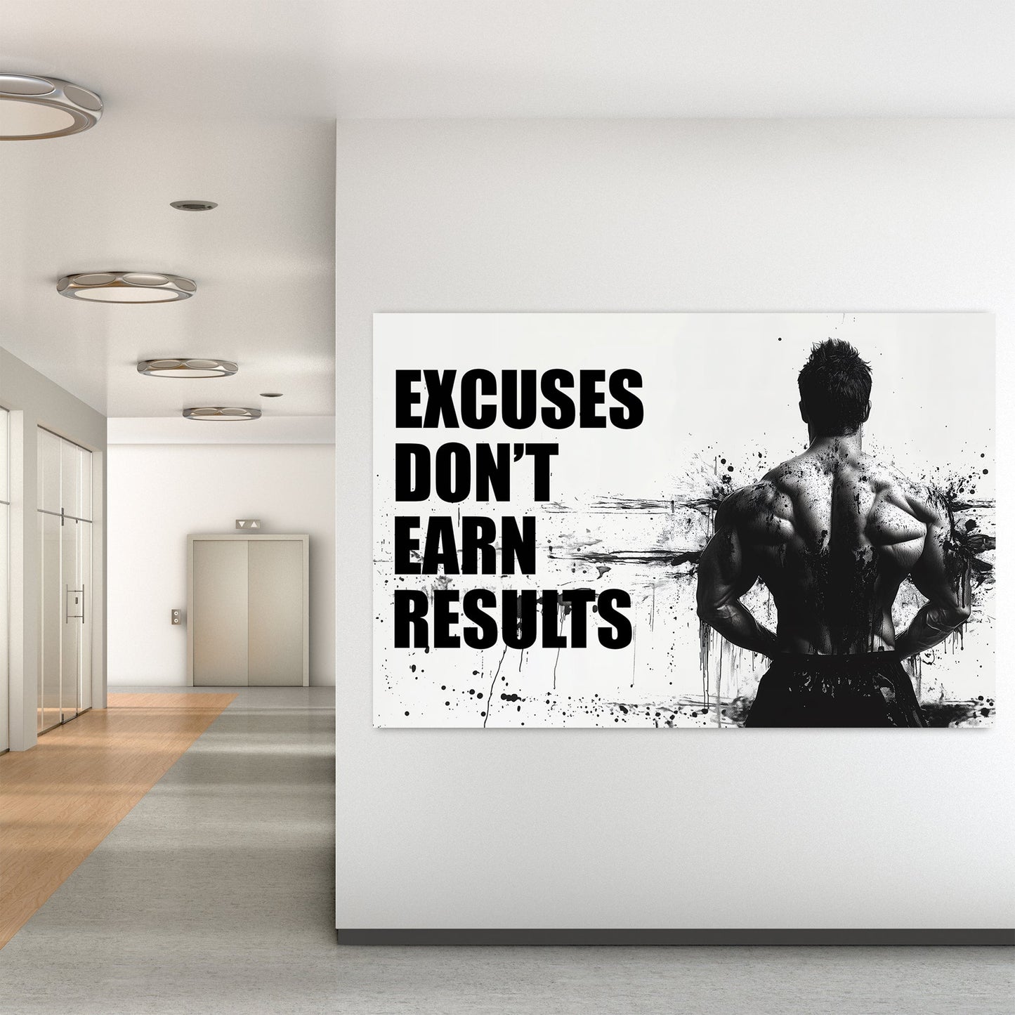 A black-and-white wall art print of a bodybuilder’s back with bold text reading "Excuses Don’t Earn Results," surrounded by ink splatter for a dramatic effect.